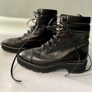 Authentic Stuart Weitzman combat boots.